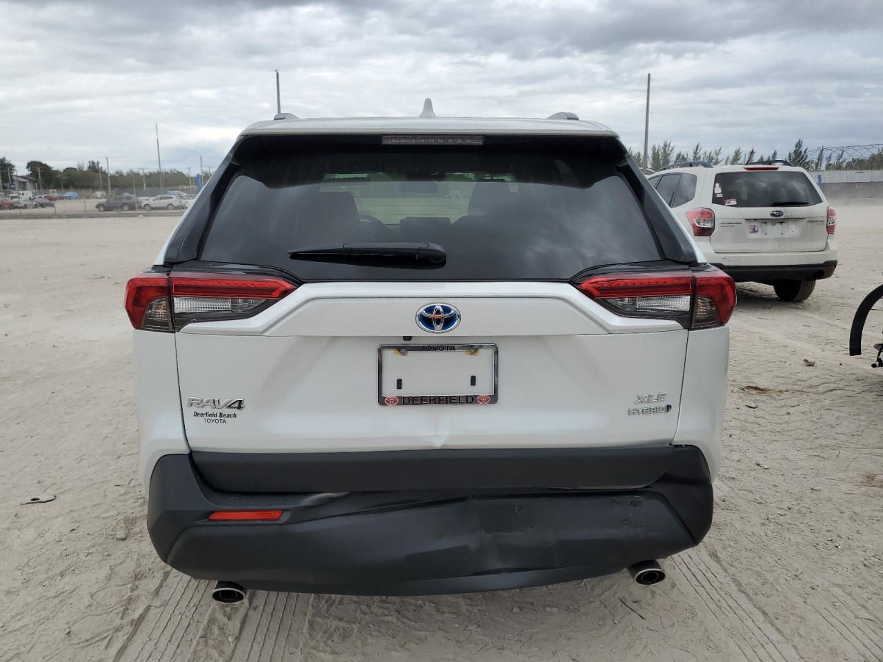 2023 Toyota RAV 4 VIN JTMB6RFV6PD091843 Copart auction photo, front end / rear end damage thumbnail 6