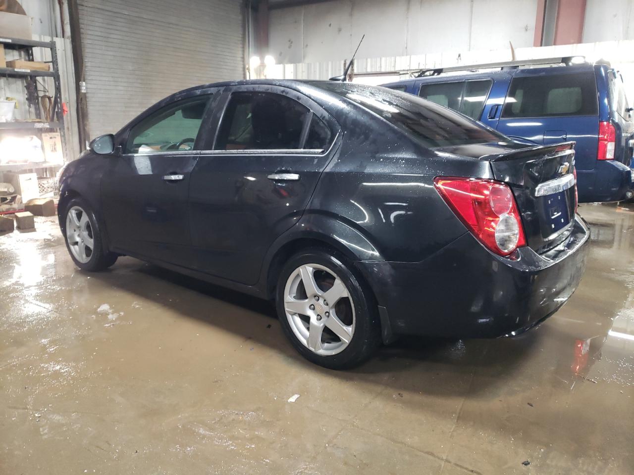 2014 Chevrolet Sonic VIN 1G1JE5SB6E4223900 Copart auction photo, front end / side damage thumbnail 2