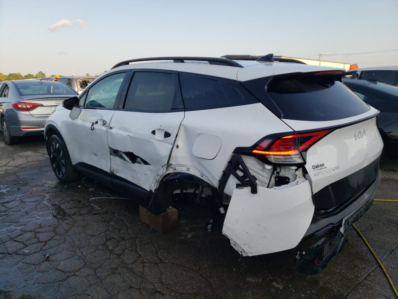 2023 KIA Sportage VIN 5XYK6CAF7PG104145 Copart auction photo, side / rear end damage thumbnail 2