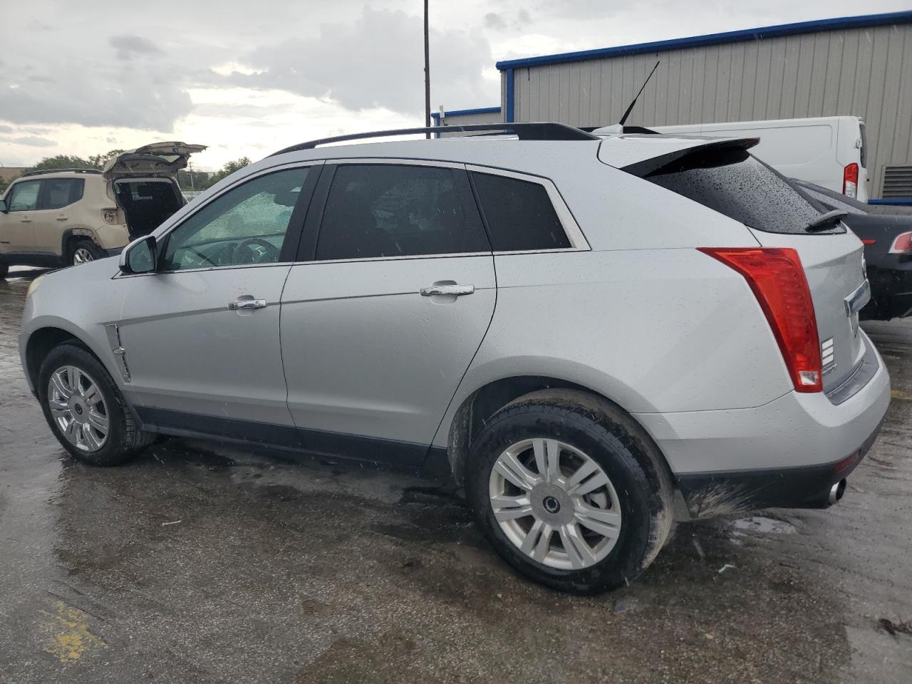 2012 Cadillac SRX VIN 3GYFNGE35CS536439 Copart auction photo, front end / side damage thumbnail 2