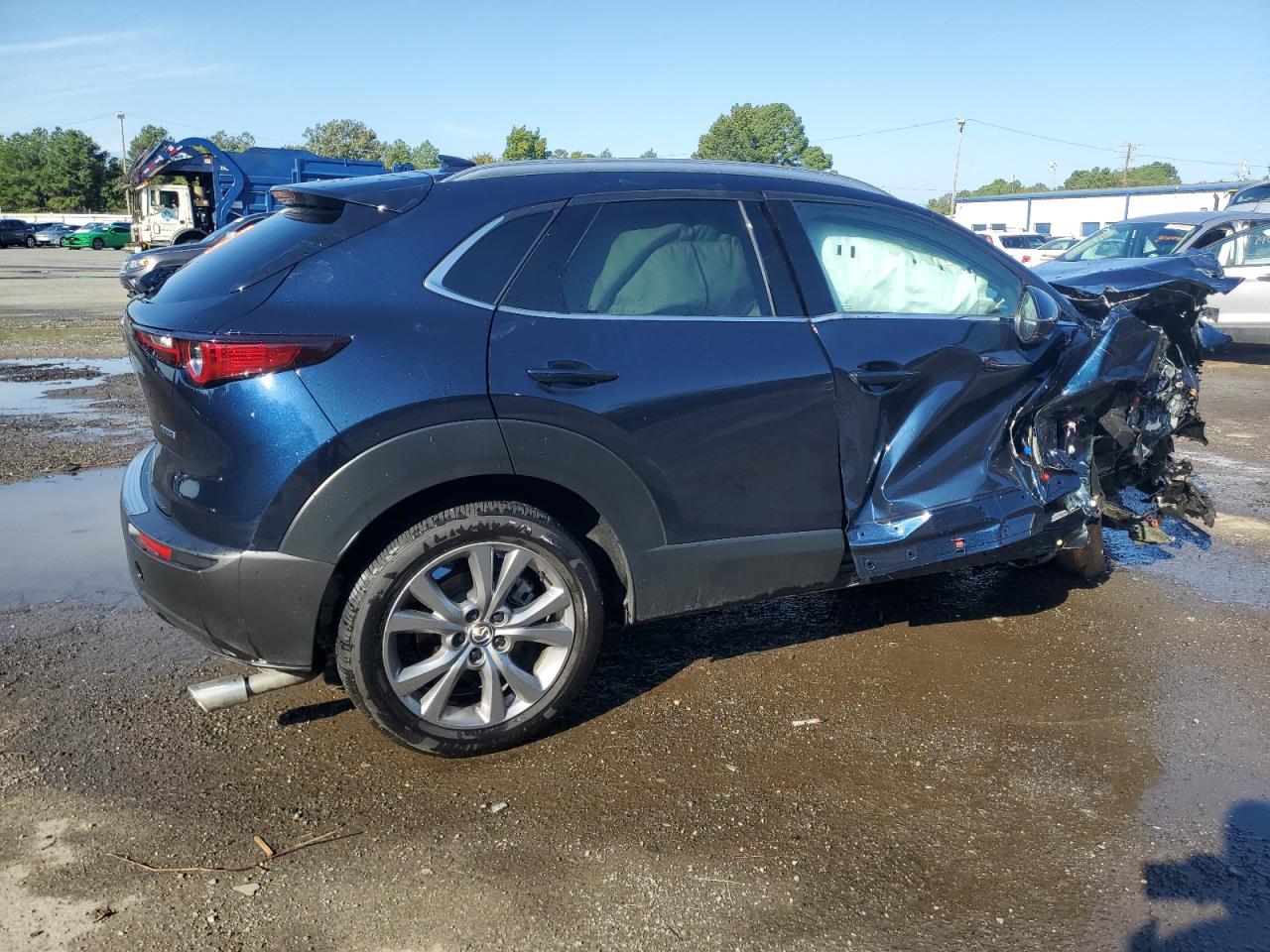 2024 Mazda CX-30 VIN 3MVDMBDM7RM600523 Copart auction photo, front end / side damage thumbnail 3
