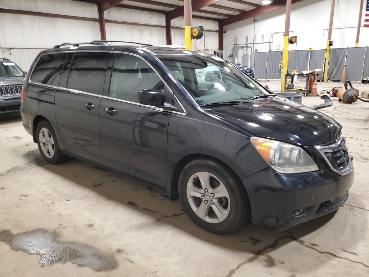 2010 Honda Odyssey VIN 5FNRL3H95AB061477 Copart auction photo, front end damage thumbnail 4