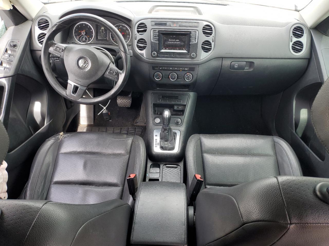 2016 Volkswagen Tiguan VIN WVGAV7AX0GW502617 Copart auction photo, side / front end damage thumbnail 8