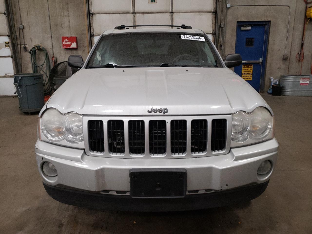 2007 Jeep Grand Cherokee VIN 1J8GR48K07C579977 Copart auction photo, rear end damage thumbnail 5