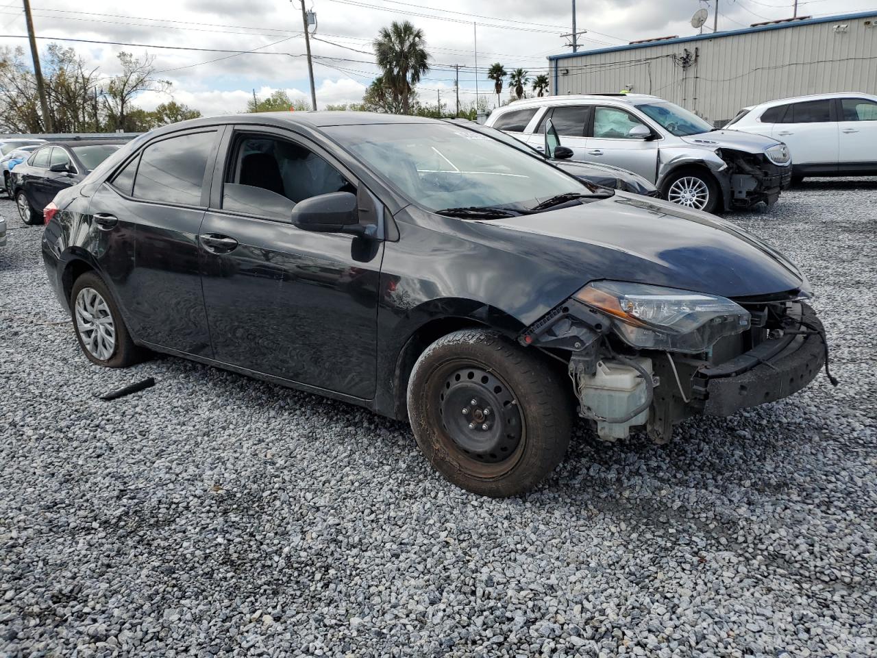2017 Toyota Corolla VIN 5YFBURHE7HP585212 Copart auction photo, side / front end damage thumbnail 4