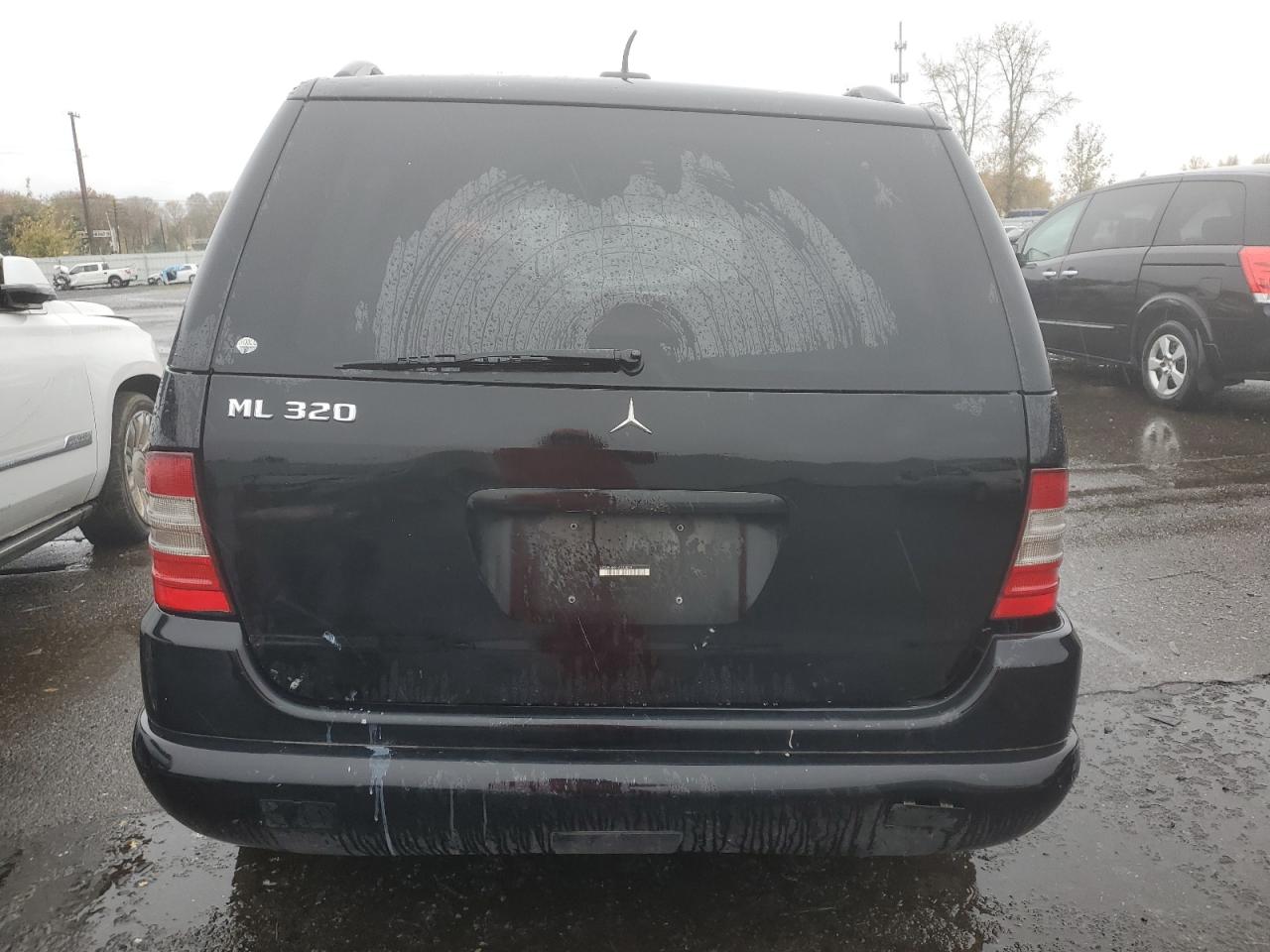 2001 Mercedes-Benz M-klasse VIN 4JGAB54E51A273024 Copart auction photo, biohazard/chemical / side damage thumbnail 6