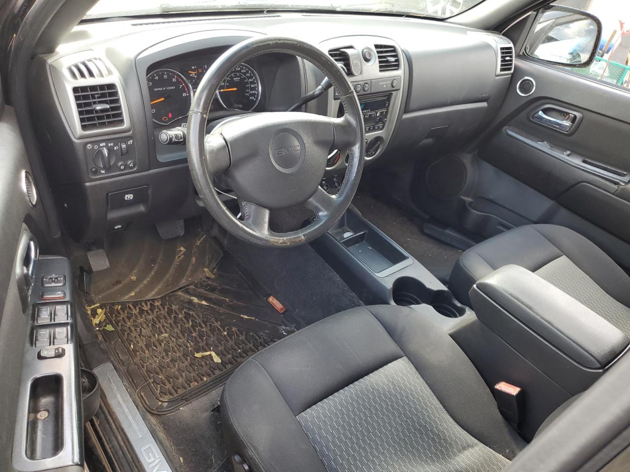 2011 GMC Canyon VIN 1GTH6MFE8B8102114 Copart auction photo, all over damage thumbnail 8