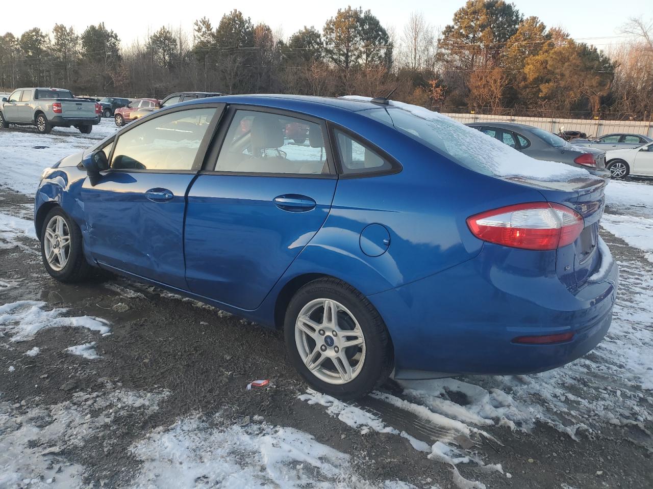 2018 Ford Fiesta VIN 3FADP4BJ6JM138656 Copart auction photo, side / front end damage thumbnail 2
