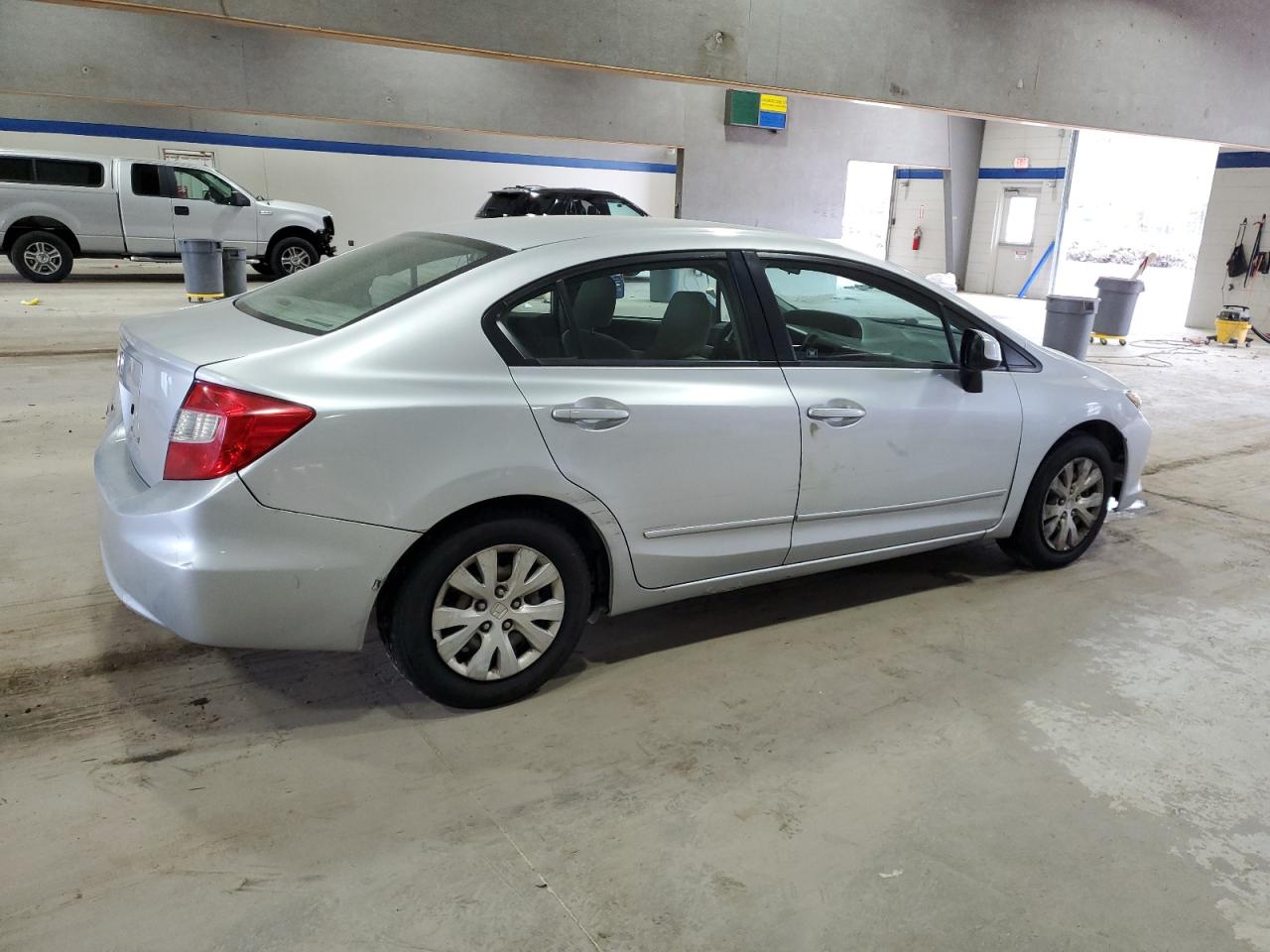 2012 Honda Civic VIN 19XFB2F54CE336538 Copart auction photo, side / front end damage thumbnail 3