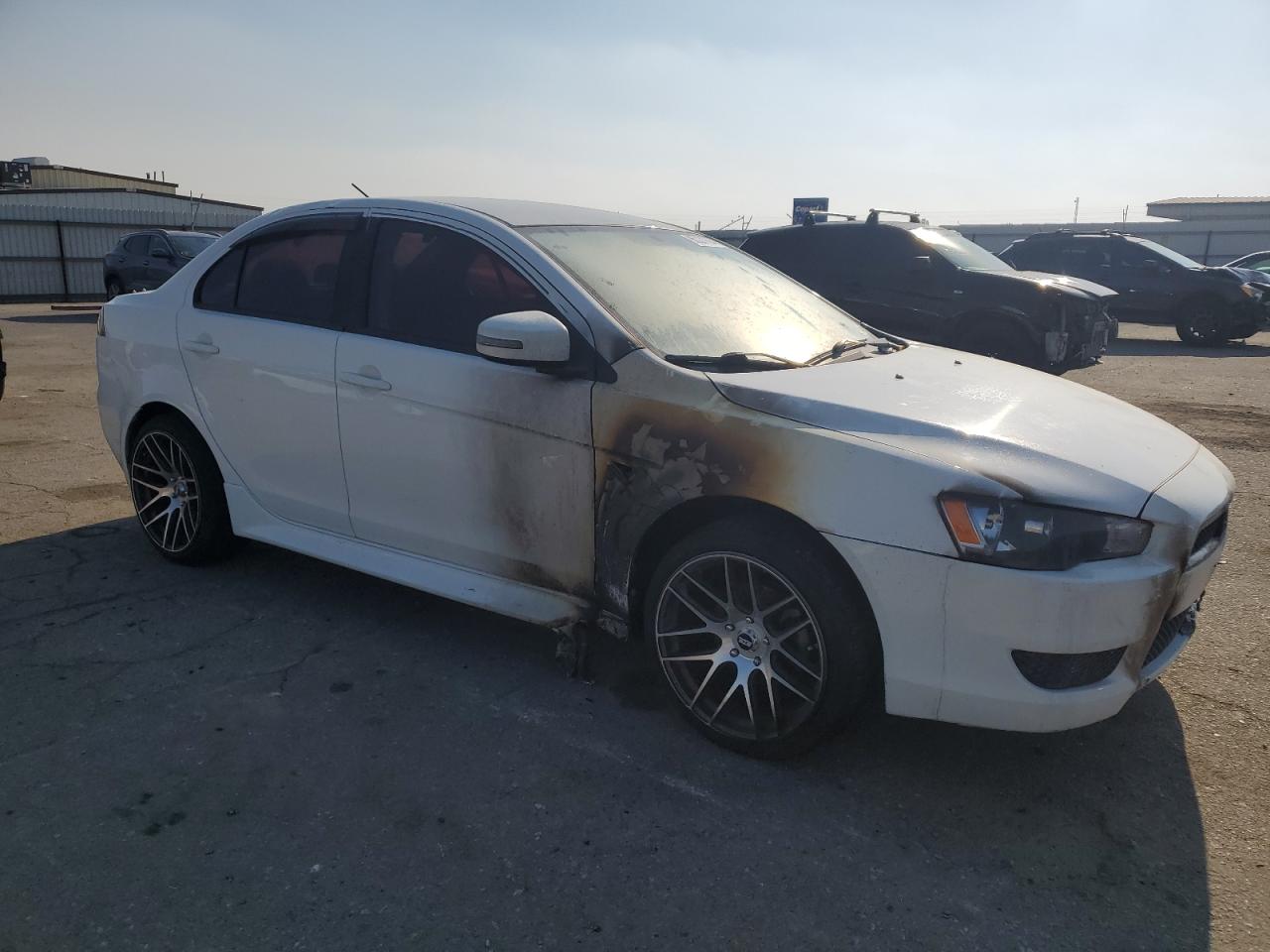 2015 Mitsubishi Lancer VIN JA32U2FU1FU009731 Copart auction photo, burn / front end damage thumbnail 4