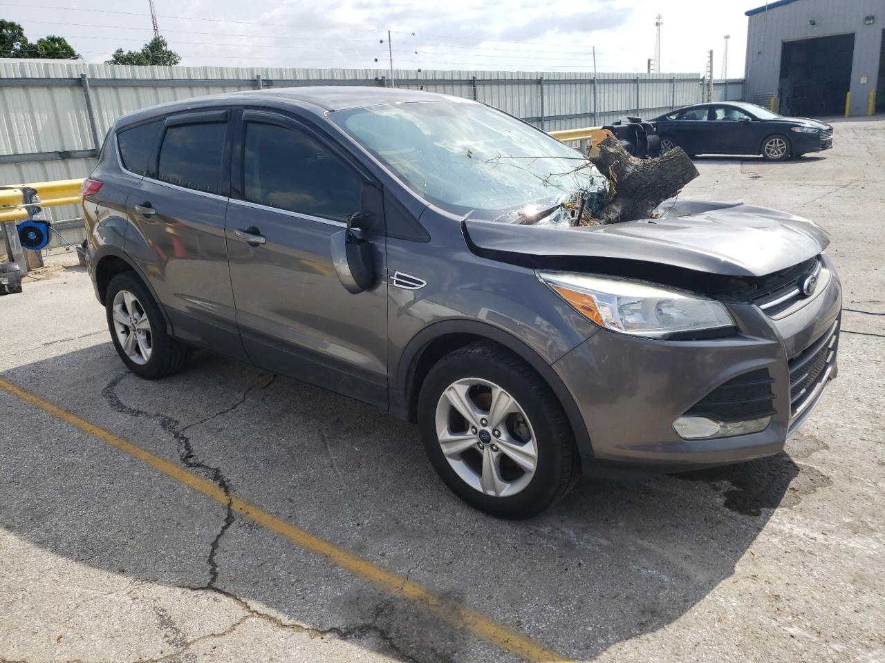 2013 Ford Escape VIN 1FMCU0GX1DUC12582 Copart auction photo, front end / side damage thumbnail 4