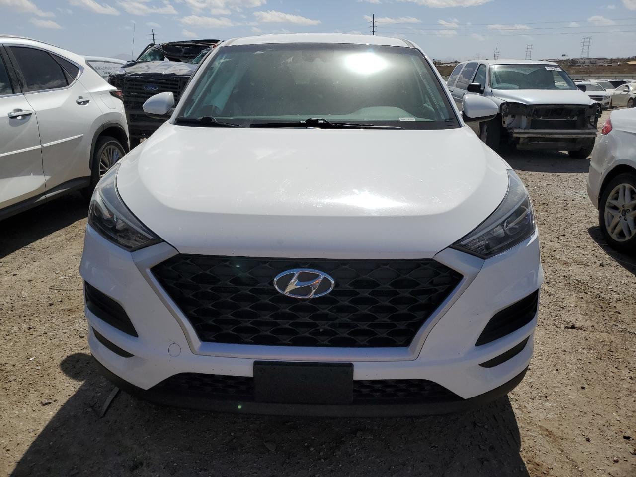 2019 Hyundai Tucson VIN KM8J23A4XKU855409 Copart auction photo, side damage thumbnail 5