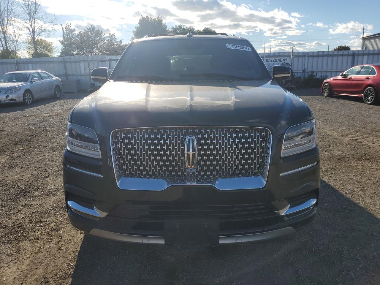 2021 Lincoln Navigator VIN 5LMJJ2LT0MEL08497 Copart auction photo, vandalism damage thumbnail 5