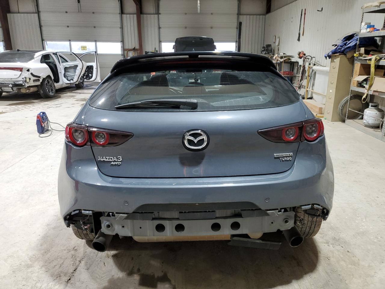 2021 Mazda 3 VIN JM1BPBNY0M1334883 Copart auction photo, all over damage thumbnail 6