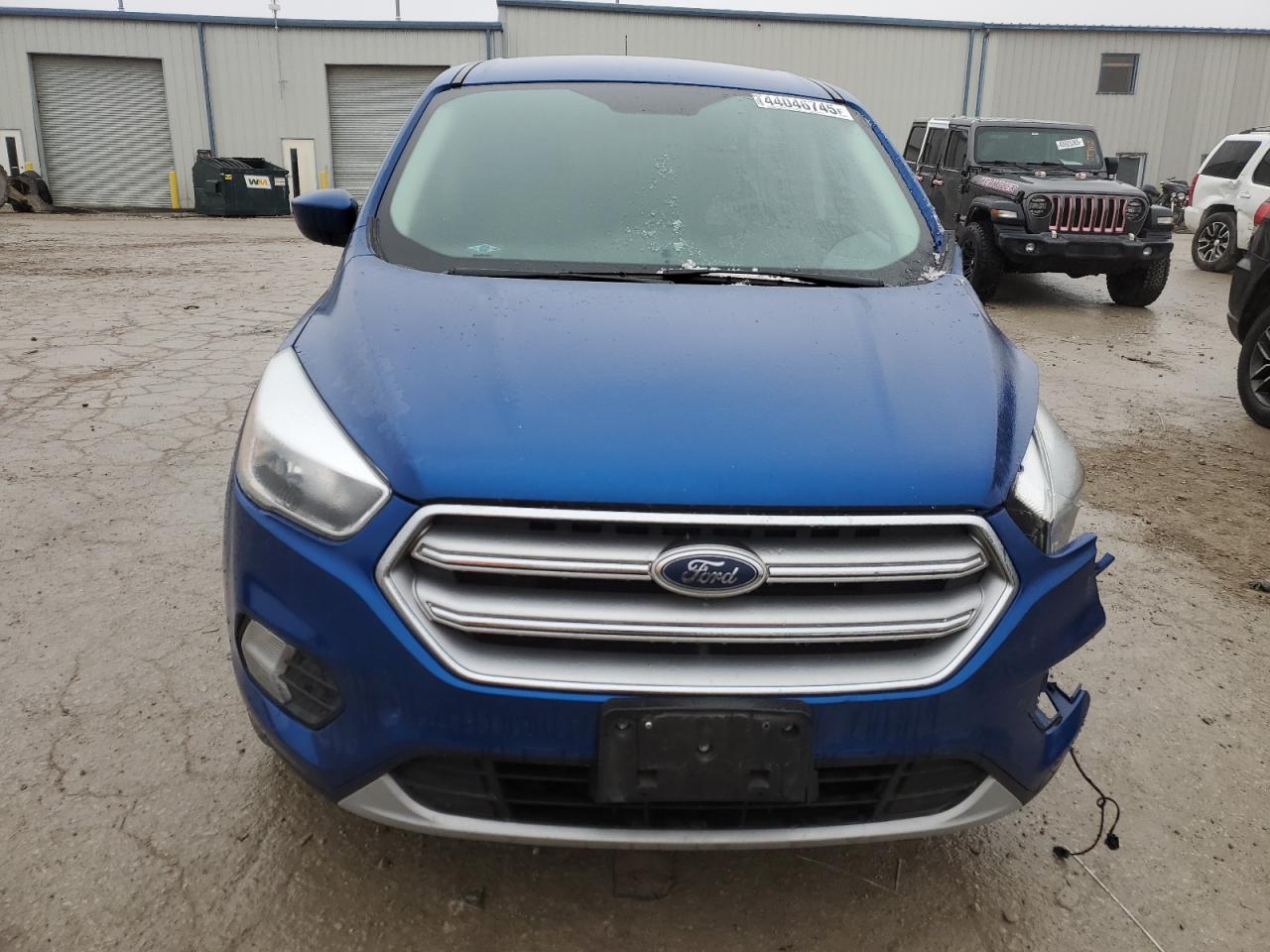 2017 Ford Escape VIN 1FMCU0GD4HUD66098 Copart auction photo, side / undercarriage damage thumbnail 5