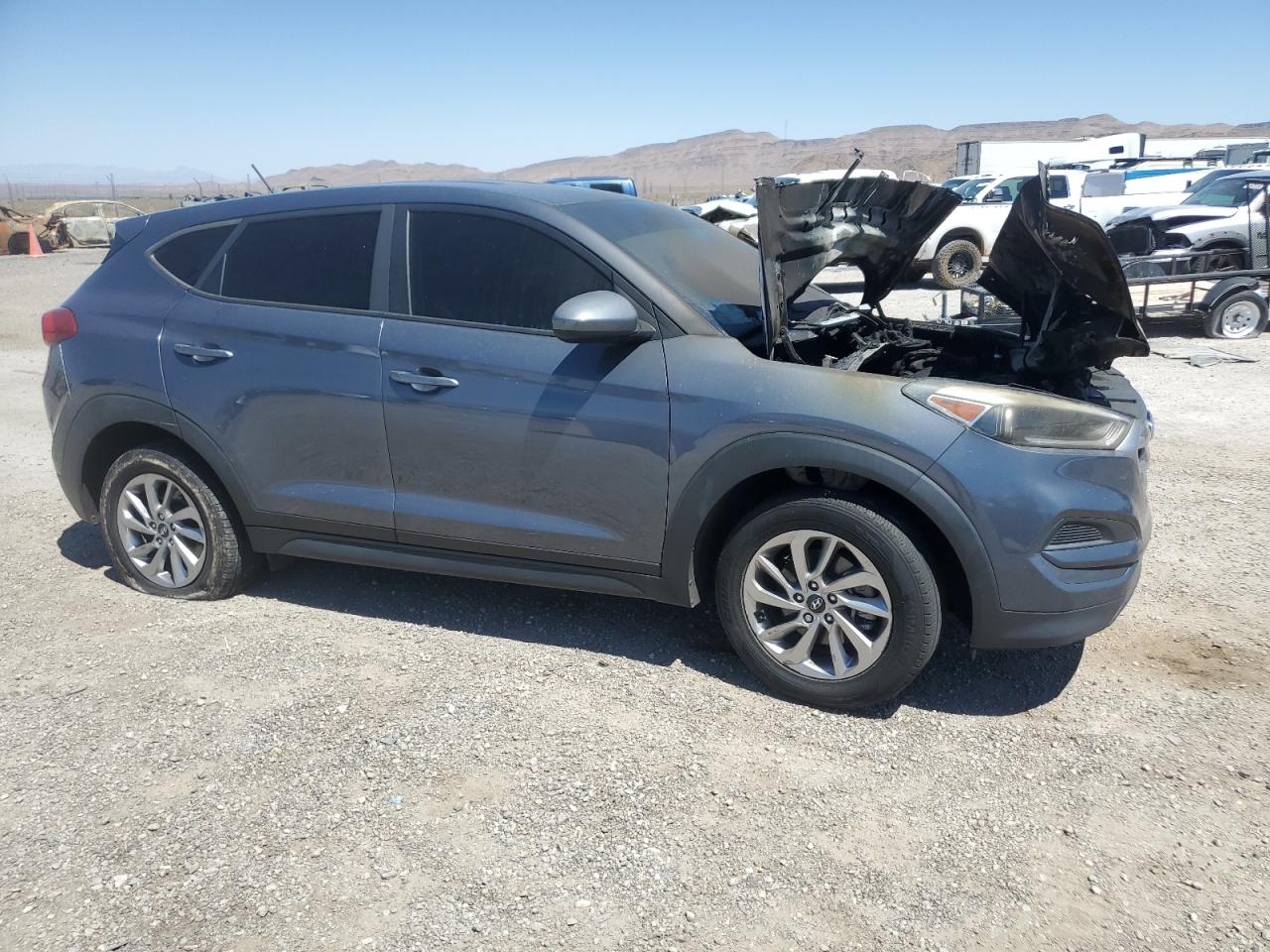 2018 Hyundai Tucson VIN KM8J23A49JU747300 Copart auction photo, burn damage thumbnail 4