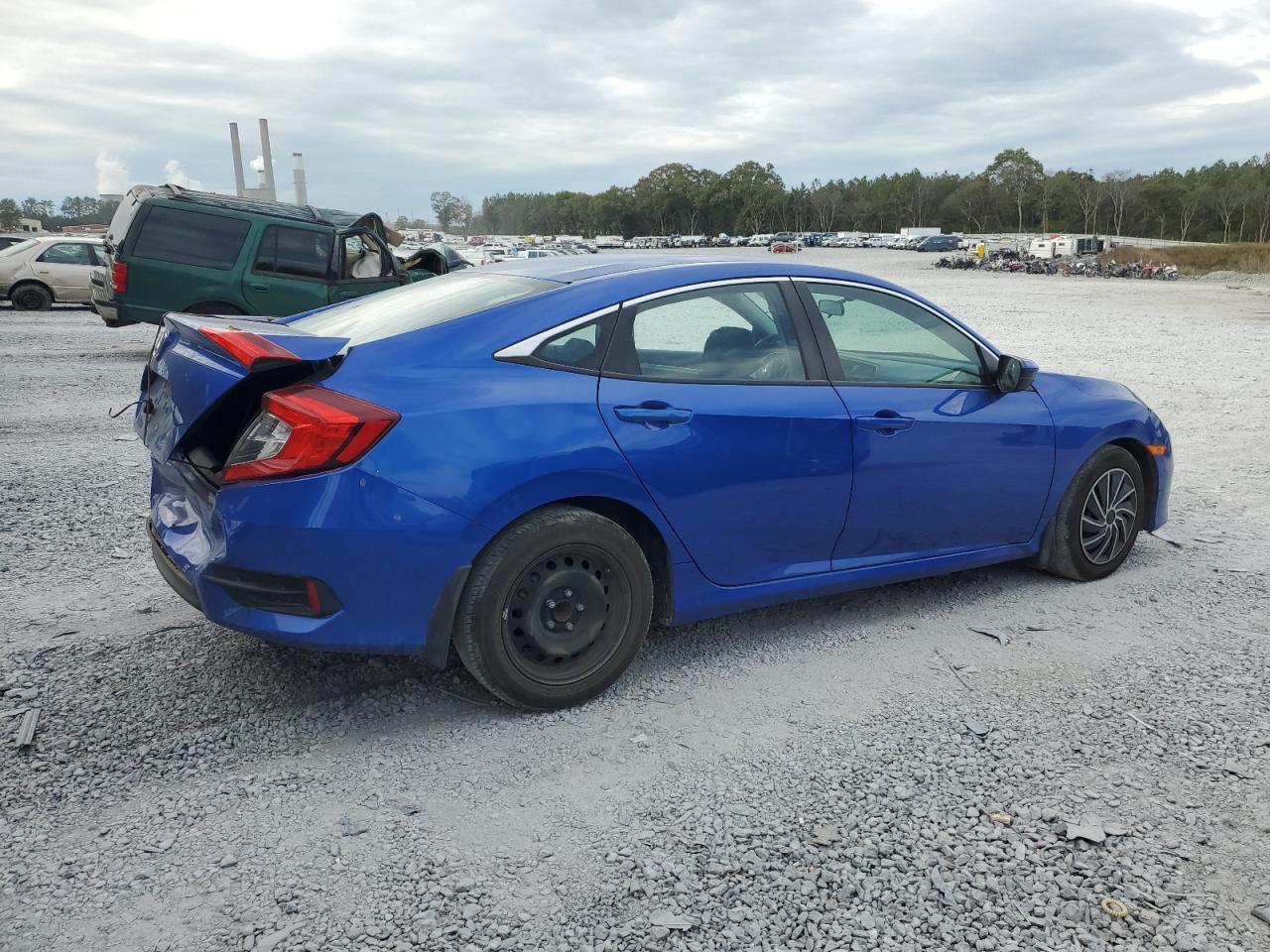 2018 Honda Civic VIN 19XFC2F51JE025577 Copart auction photo, rear end / minor dent/scratches damage thumbnail 3