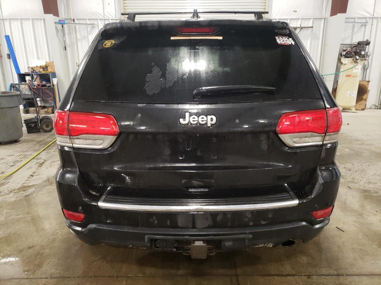 2015 Jeep Grand Cherokee VIN 1C4RJFBG7FC778904 Copart auction photo, front end / side damage thumbnail 6