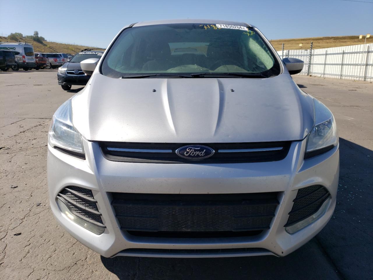 2015 Ford Escape VIN 1FMCU9GX8FUB06556 Copart auction photo, side / hail damage thumbnail 5