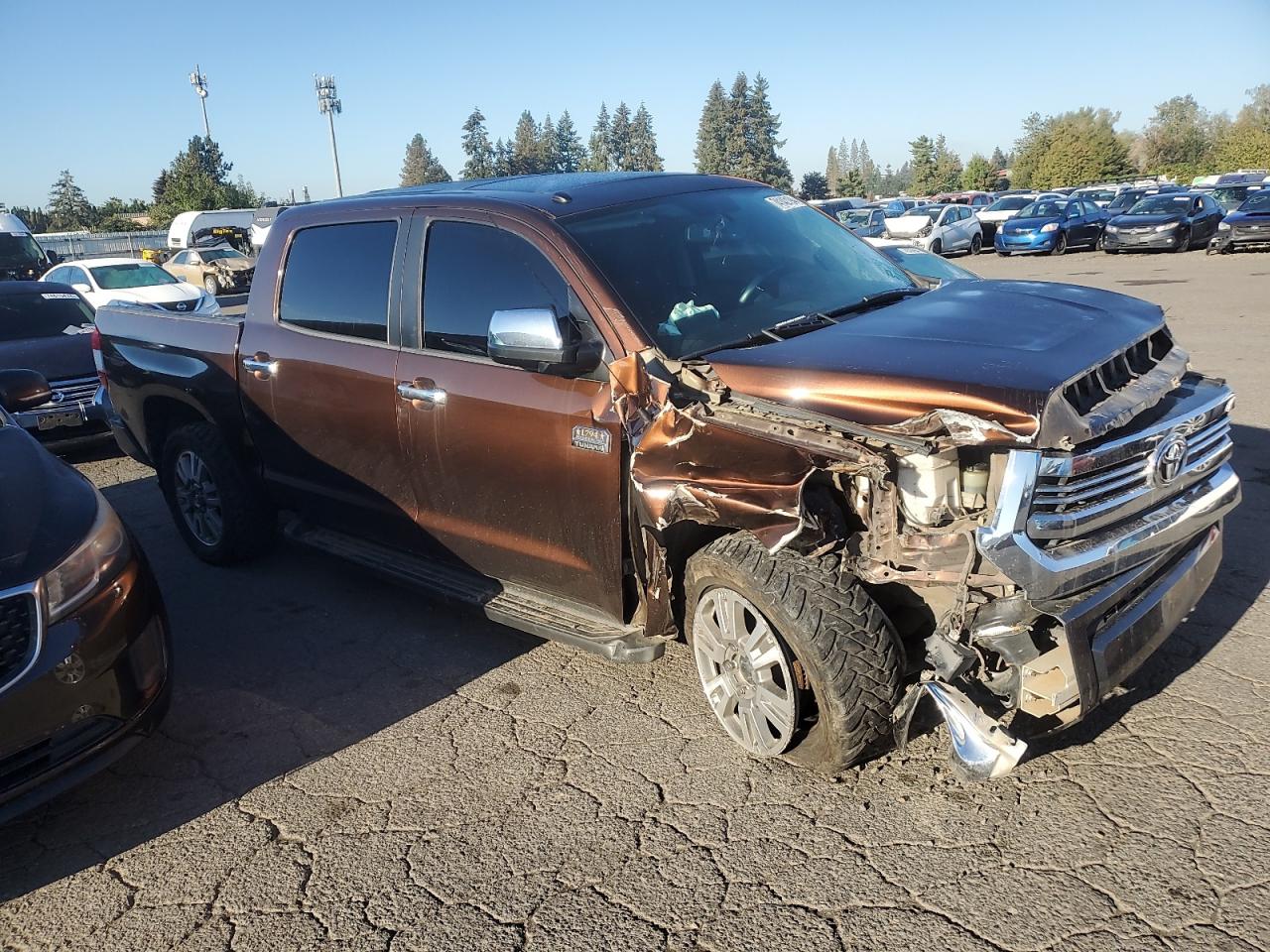 2017 Toyota Tundra VIN 5TFAW5F19HX583509 Copart auction photo, all over damage thumbnail 4