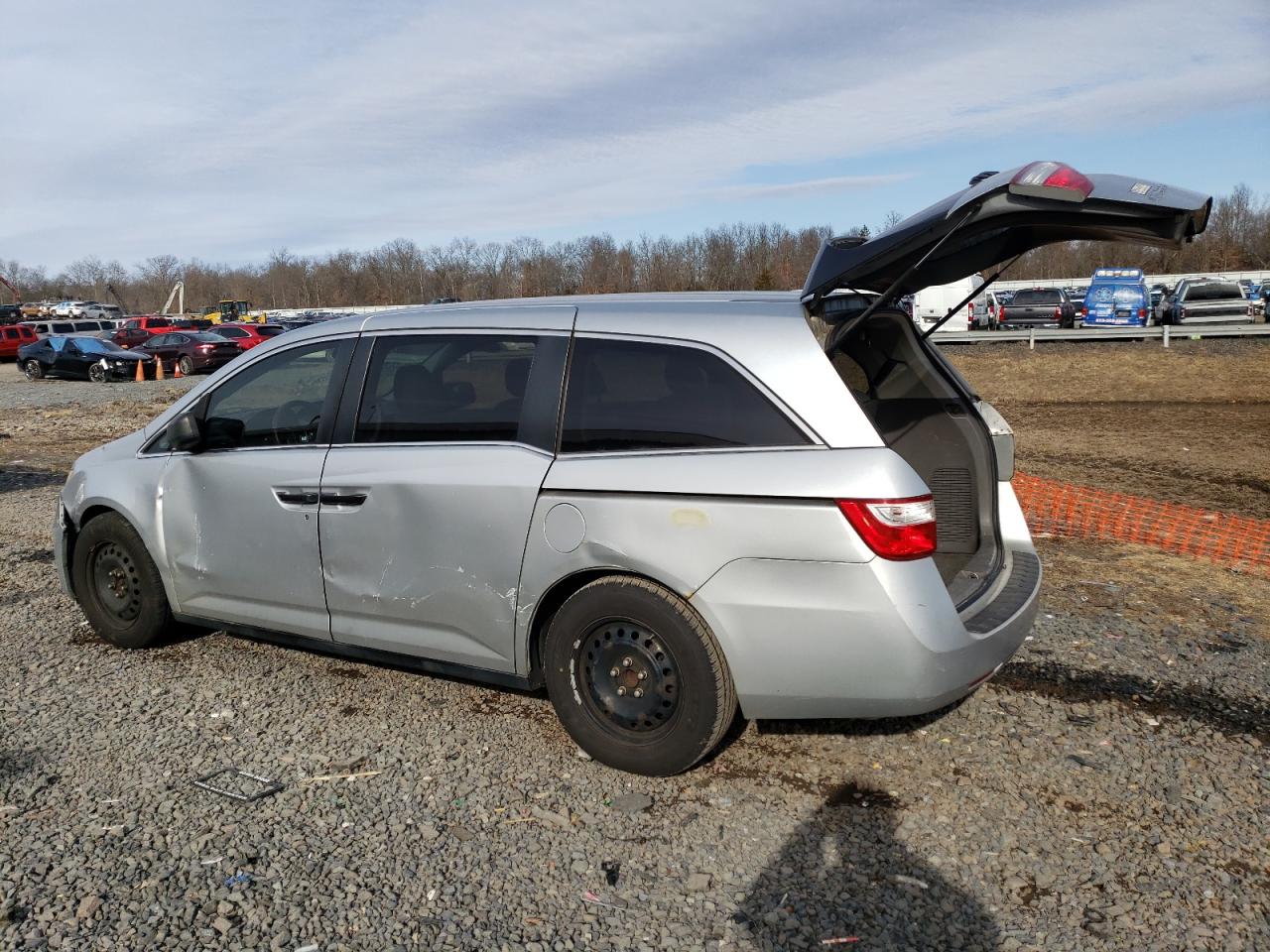 2012 Honda Odyssey VIN 5FNRL5H27CB061269 Copart auction photo, side / front end damage thumbnail 2