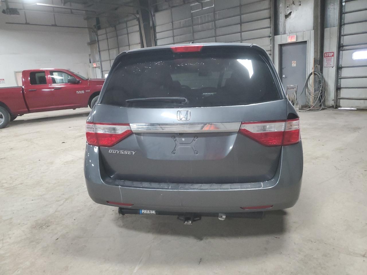 2012 Honda Odyssey VIN 5FNRL5H67CB041705 Copart auction photo, front end / undercarriage damage thumbnail 6