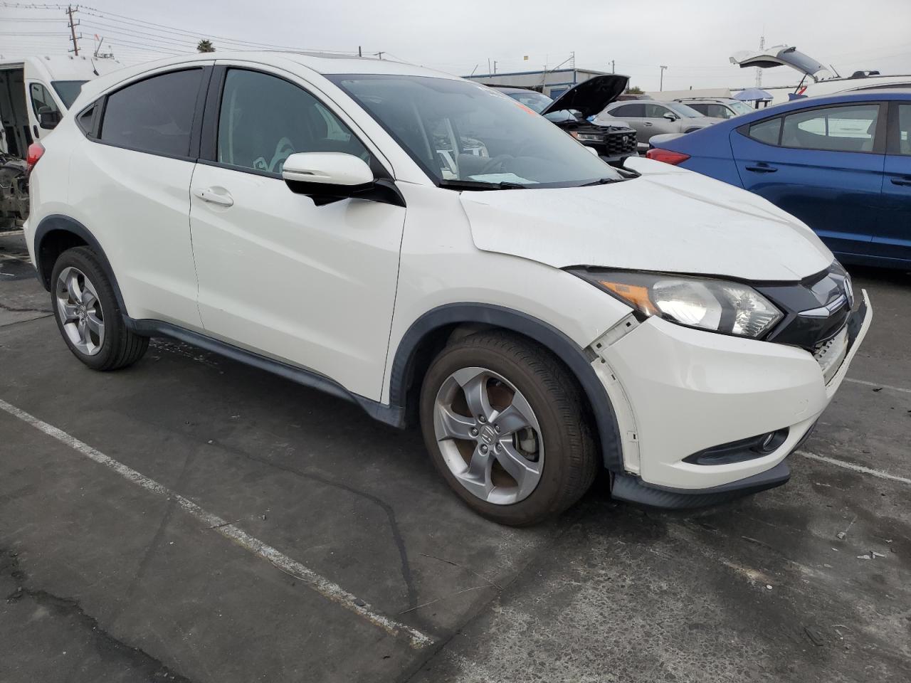 2017 Honda HR-V VIN 3CZRU5H52HM710948 Copart auction photo, front end / minor dent/scratches damage thumbnail 4