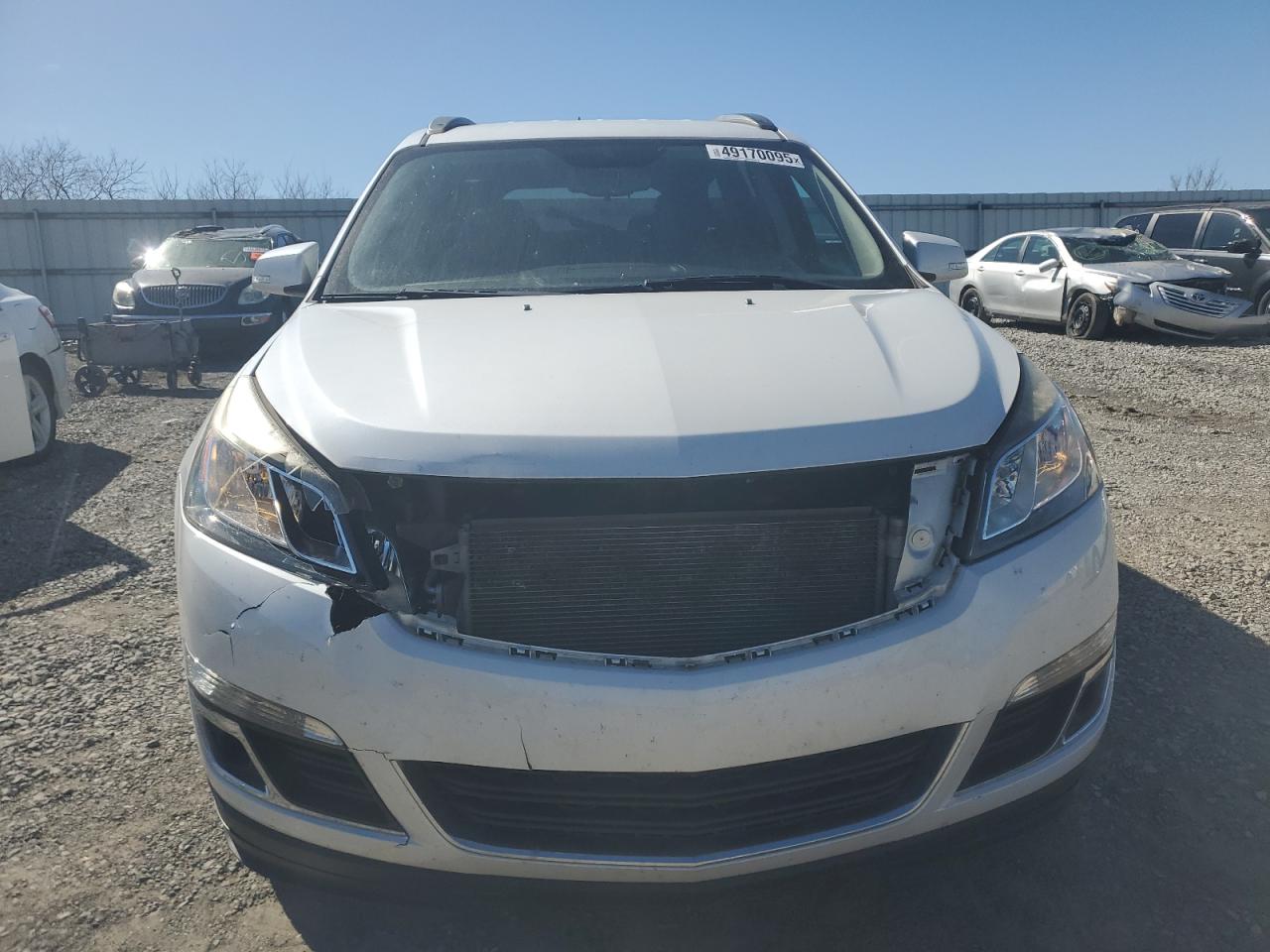 2016 Chevrolet Traverse VIN 1GNKRGKD2GJ217021 Copart auction photo, front end / minor dent/scratches damage thumbnail 5