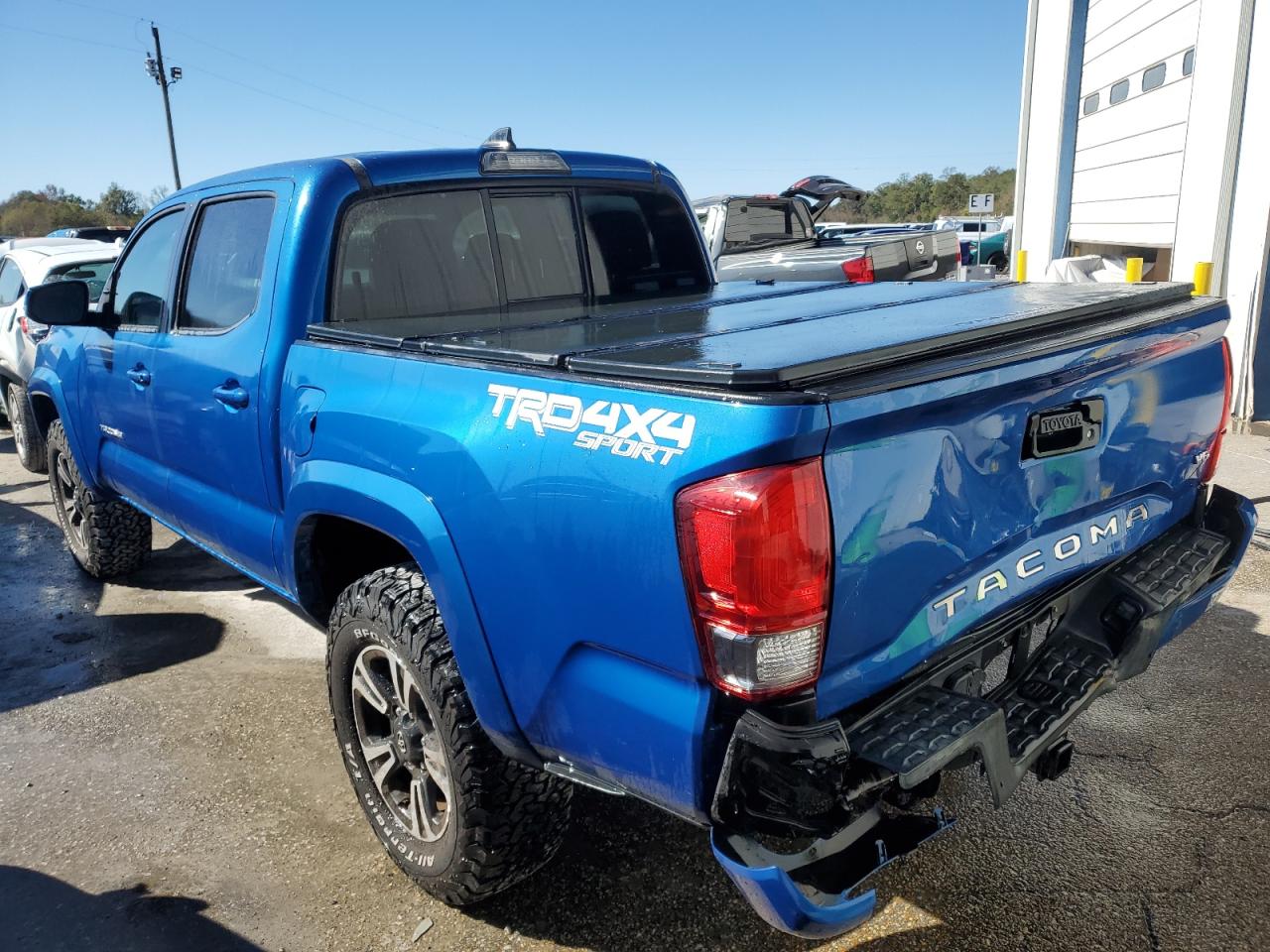 2016 Toyota Tacoma VIN 3TMCZ5AN1GM023269 Copart auction photo, rear end damage thumbnail 2