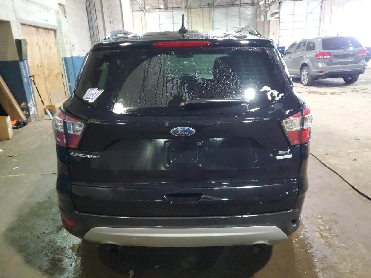 2018 Ford Escape VIN 1FMCU0GD4JUC57467 Copart auction photo, all over damage thumbnail 6