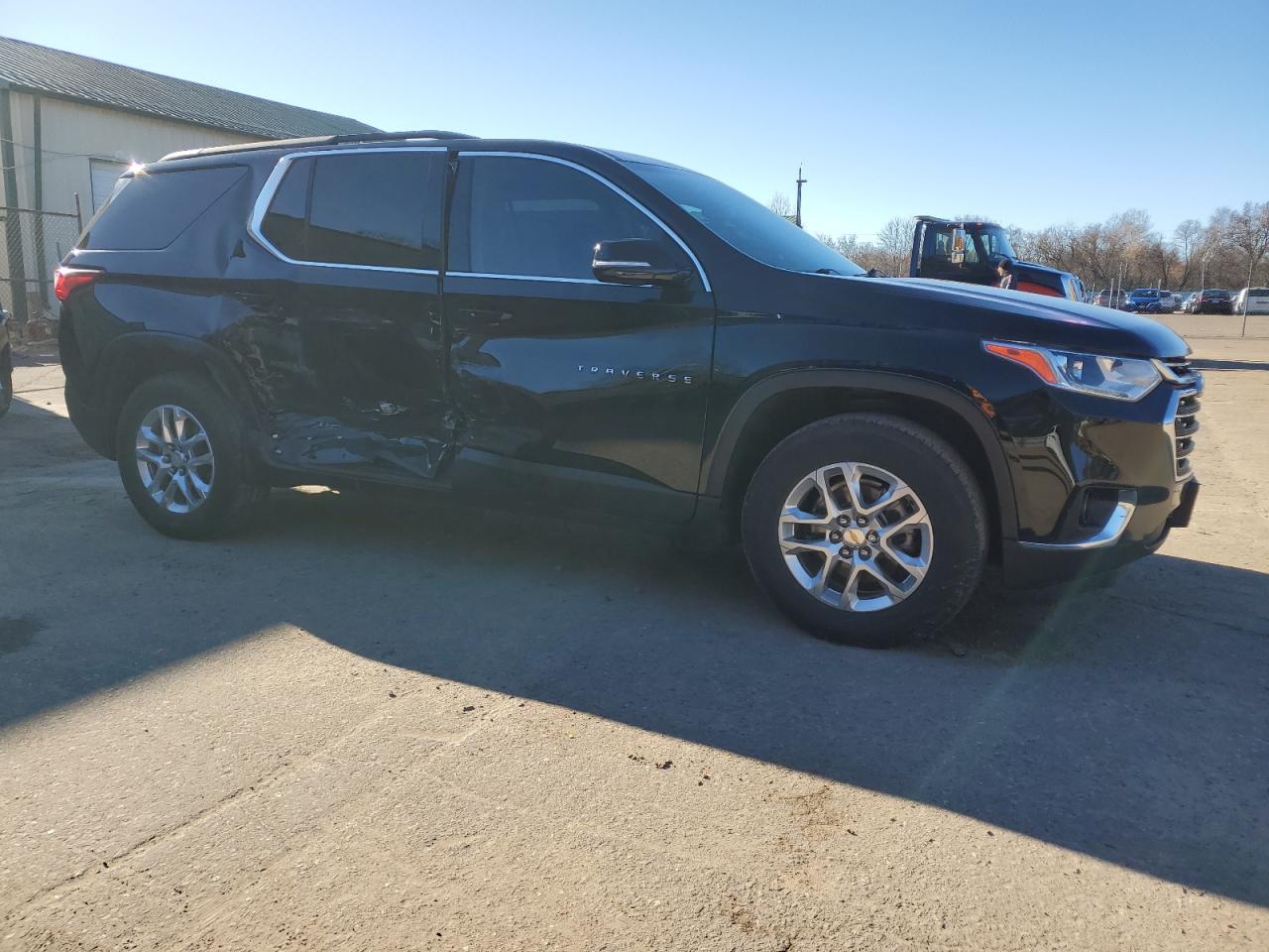2020 Chevrolet Traverse VIN 1GNEVGKWXLJ313838 Copart auction photo, side damage thumbnail 4