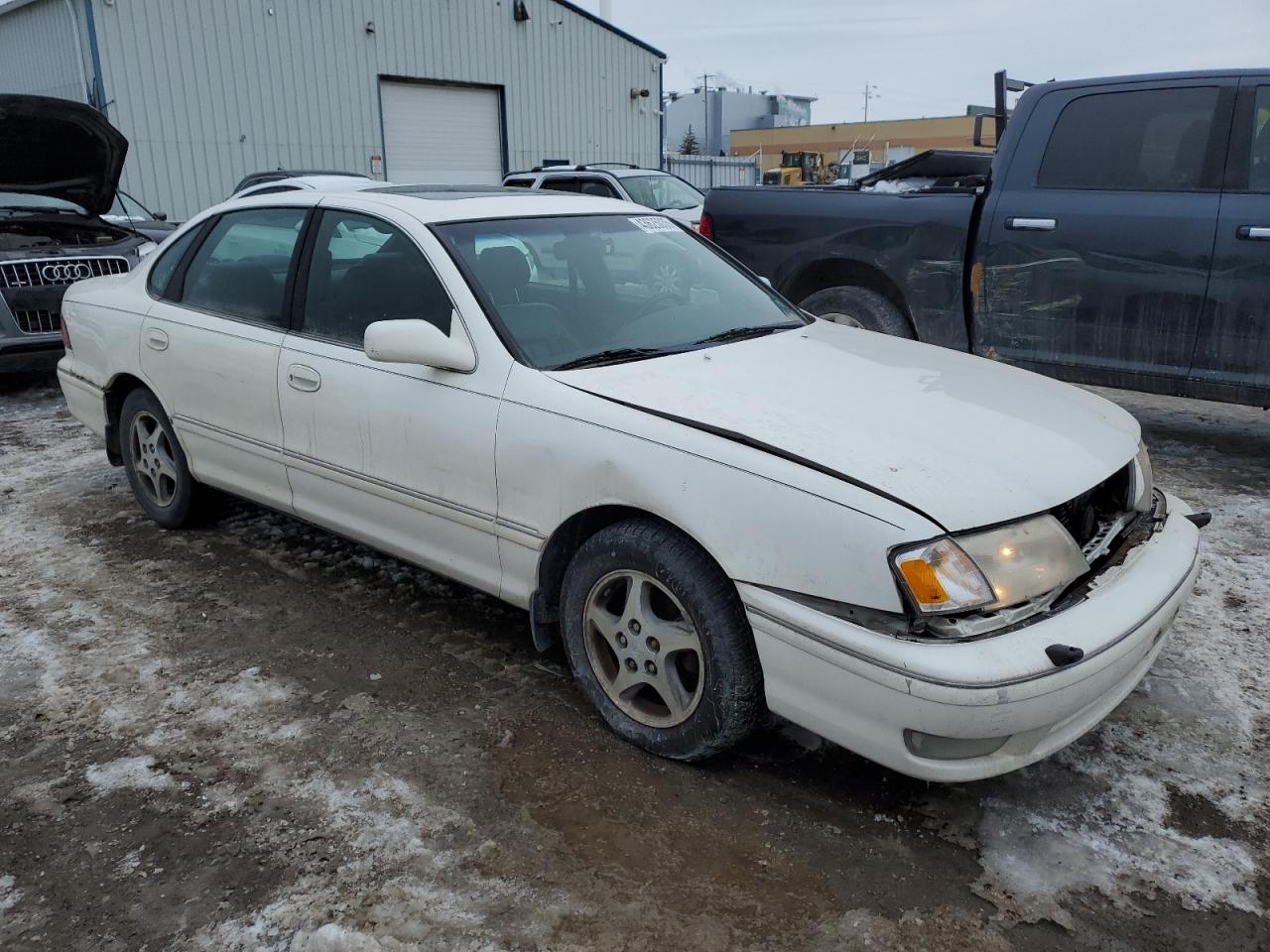 1999 Toyota Avalon VIN 4T1BF18B3XU297203 Copart auction photo, front end / minor dent/scratches damage thumbnail 4