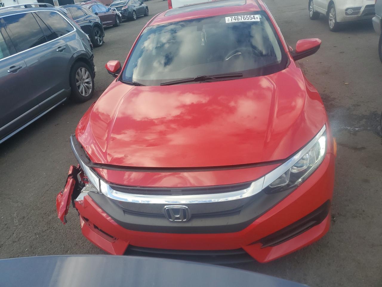 2018 Honda Civic VIN 2HGFC2F74JH530701 Copart auction photo, front end / minor dent/scratches damage thumbnail 5