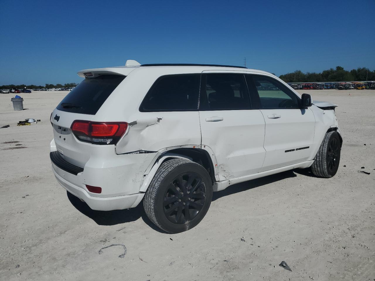 2021 Jeep Grand Cherokee VIN 1C4RJEAG5MC538601 Copart auction photo, side / front end damage thumbnail 3