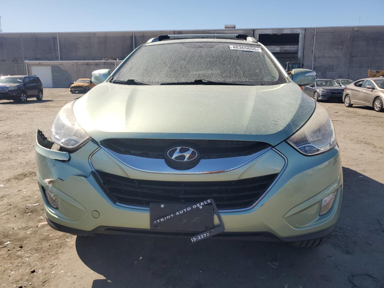 2011 Hyundai Tucson VIN KM8JUCAC3BU194565 Copart auction photo, front end / minor dent/scratches damage thumbnail 5