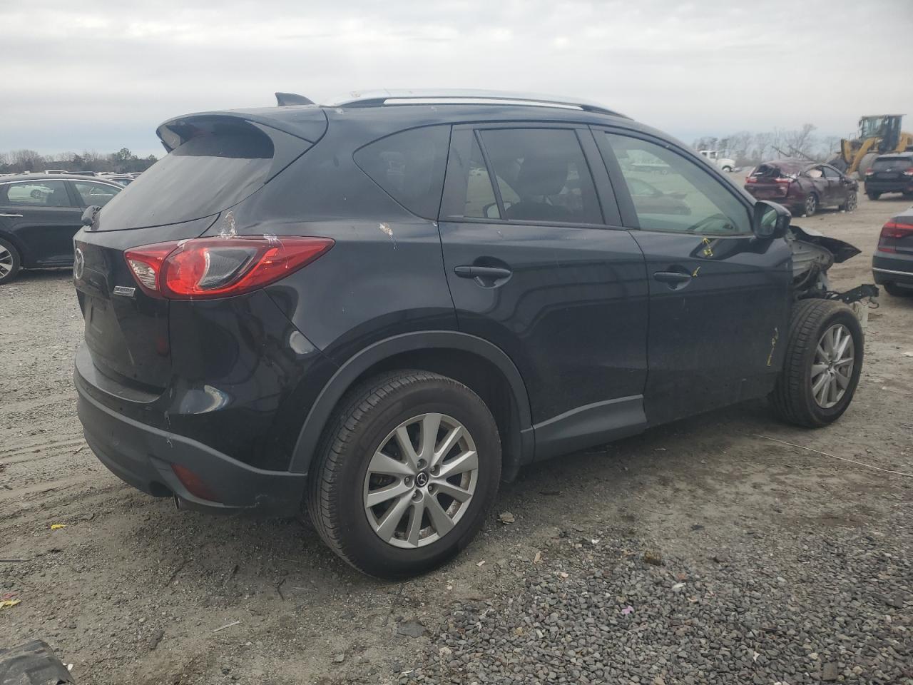 2014 Mazda CX-5 VIN JM3KE2CY3E0429347 Copart auction photo, front end / minor dent/scratches damage thumbnail 3