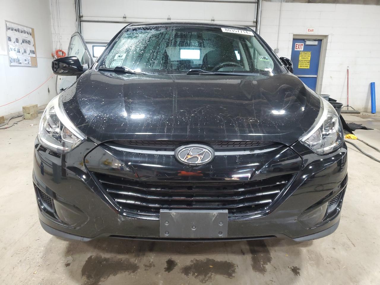2014 Hyundai Tucson VIN KM8JTCAF1EU817389 Copart auction photo, front end / side damage thumbnail 5