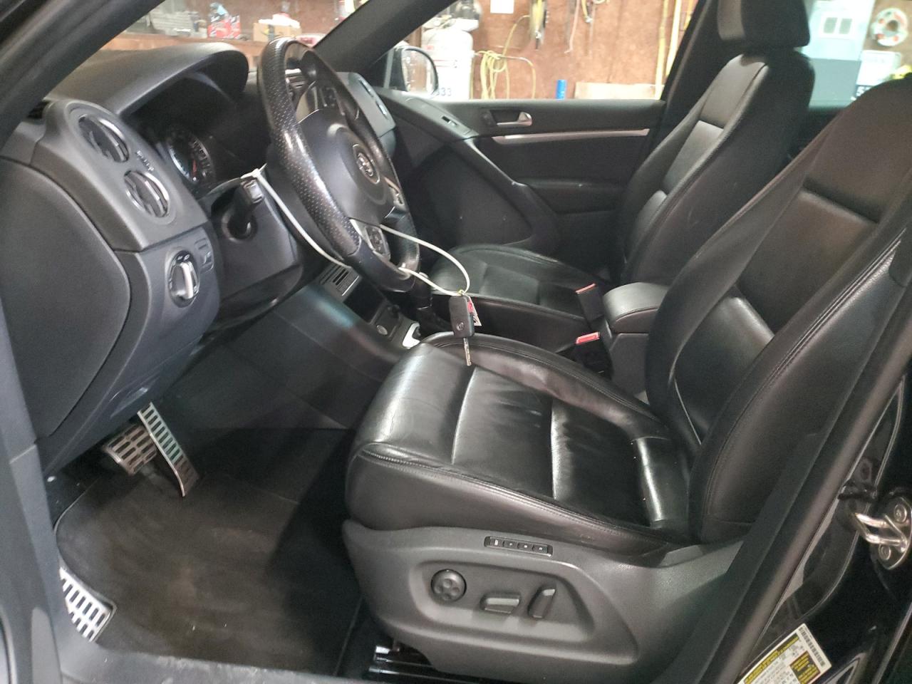 2015 Volkswagen Tiguan VIN WVGBV7AX3FW048821 Copart auction photo, front end / side damage thumbnail 7