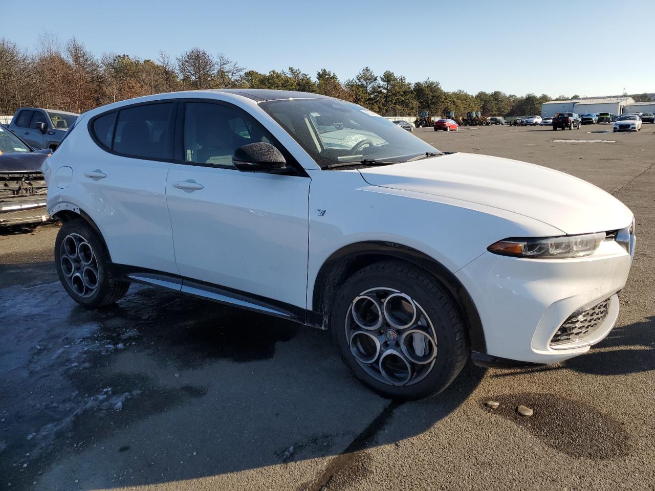 2024 Alfa Romeo Tonale VIN ZASPATCW4R3083736 Copart auction photo, rear end / minor dent/scratches damage thumbnail 4