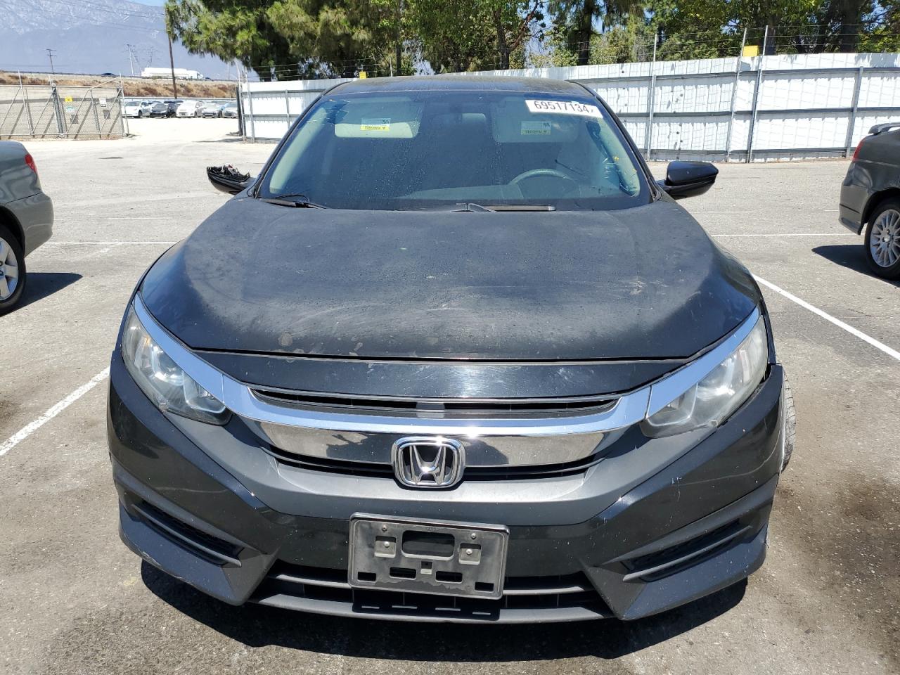 2017 Honda Civic VIN 2HGFC2F57HH549607 Copart auction photo, all over / undercarriage damage thumbnail 5