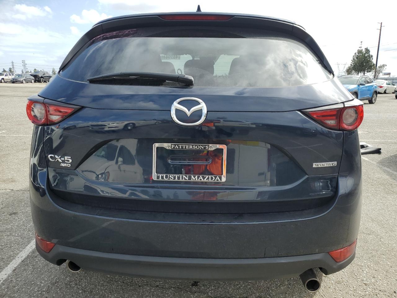 2021 Mazda CX-5 VIN JM3KFBDM1M0457610 Copart auction photo, side damage thumbnail 6