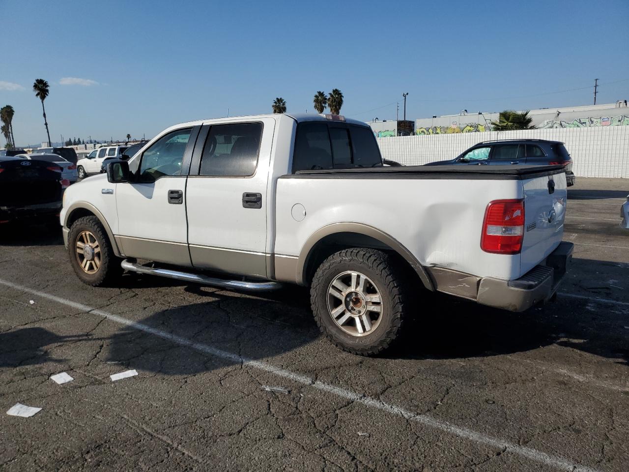 2006 Ford F-150 VIN 1FTPW12526KC02413 Copart auction photo, rear end / minor dent/scratches damage thumbnail 2