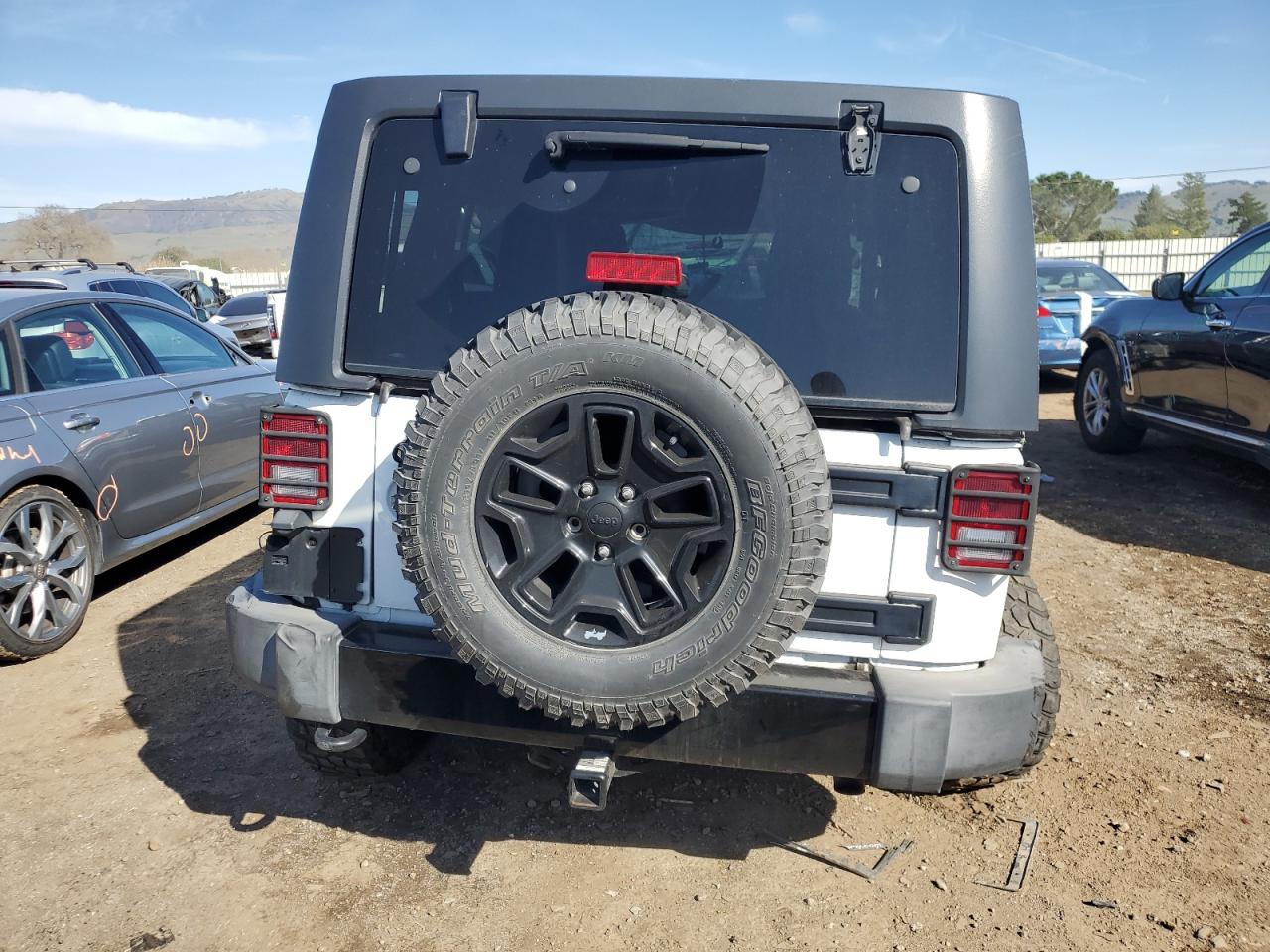 2016 Jeep Wrangler VIN 1C4BJWDG9GL225896 Copart auction photo, all over damage thumbnail 6