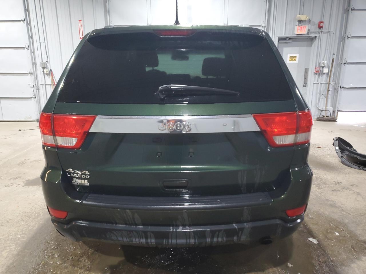 2011 Jeep Grand Cherokee VIN 1J4RR4GG8BC669264 Copart auction photo, side damage thumbnail 6