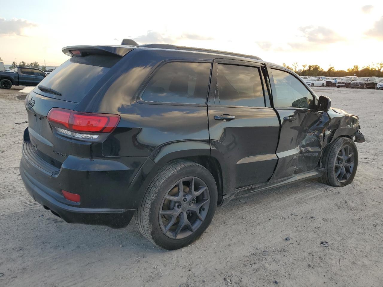 2020 Jeep Grand Cherokee VIN 1C4RJEBG4LC219428 Copart auction photo, side / front end damage thumbnail 3
