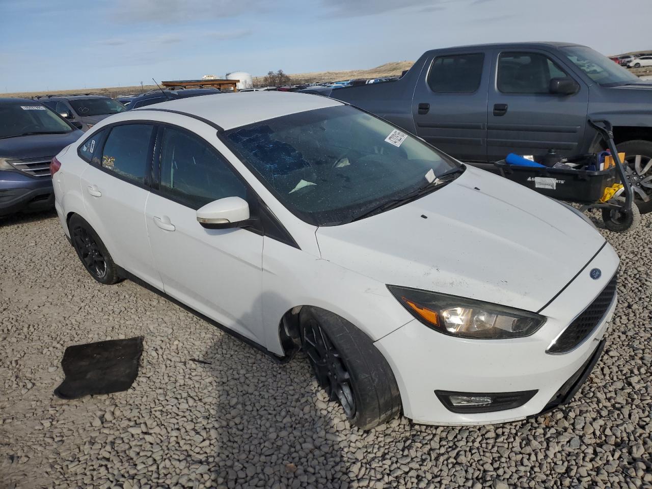 2016 Ford Focus VIN 1FADP3F2XGL340116 Copart auction photo, undercarriage / all over damage thumbnail 4