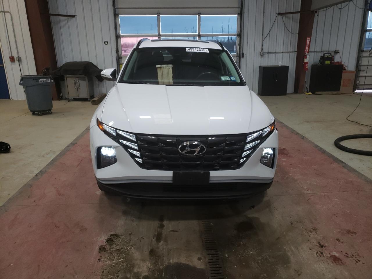 2022 Hyundai Tucson VIN 5NMJFCAE1NH140158 Copart auction photo, side damage thumbnail 5