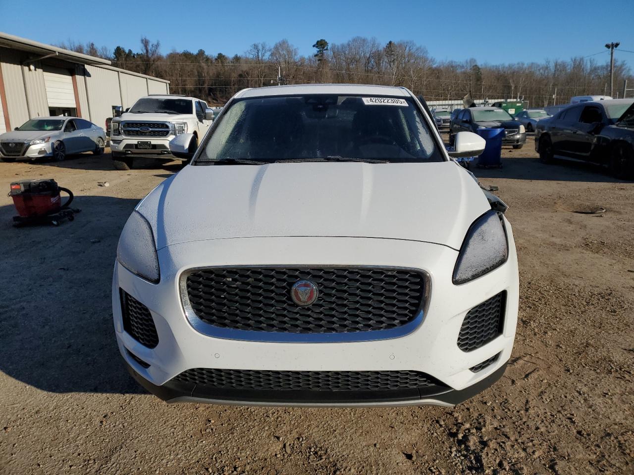 2018 Jaguar E-Pace VIN SADFJ2FX5J1Z31696 Copart auction photo, side / front end damage thumbnail 5