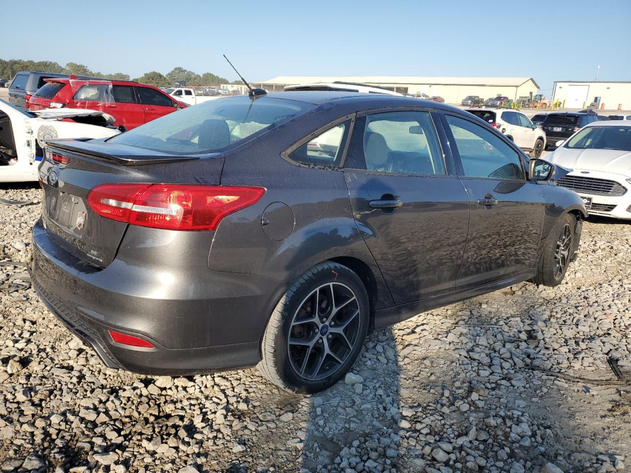 2015 Ford Focus VIN 1FADP3F20FL235261 Copart auction photo, front end / rear end damage thumbnail 3