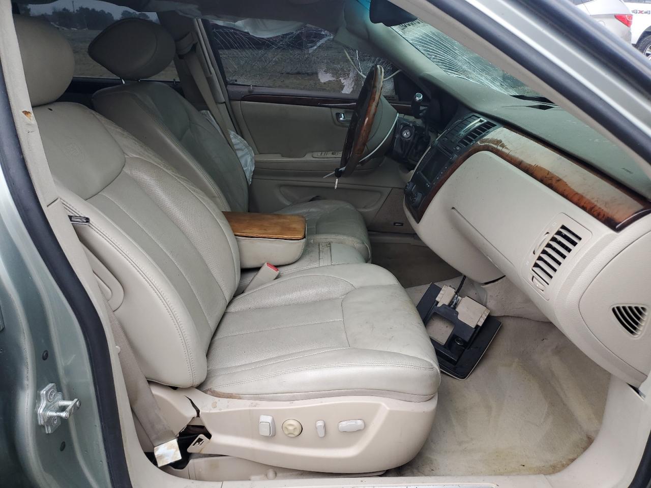 2006 Cadillac DTS VIN 1G6KD57YX6U193025 Copart auction photo, all over damage thumbnail 7